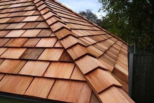 Wood roofing material